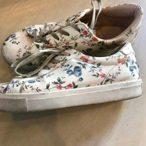 White sneakers with colorful flowers
